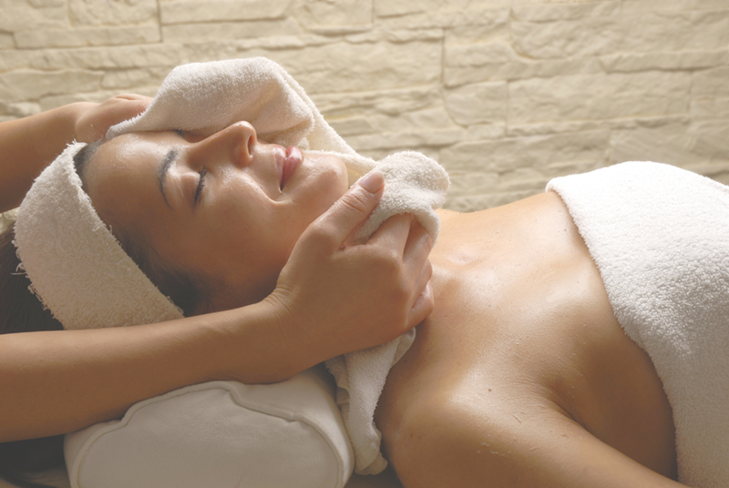 woman-recieving-medi-facials-with-towels